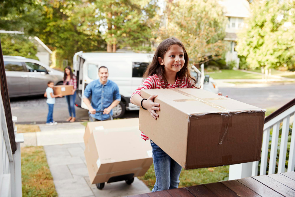 family moving boxes into new home in Arvada, Colorado