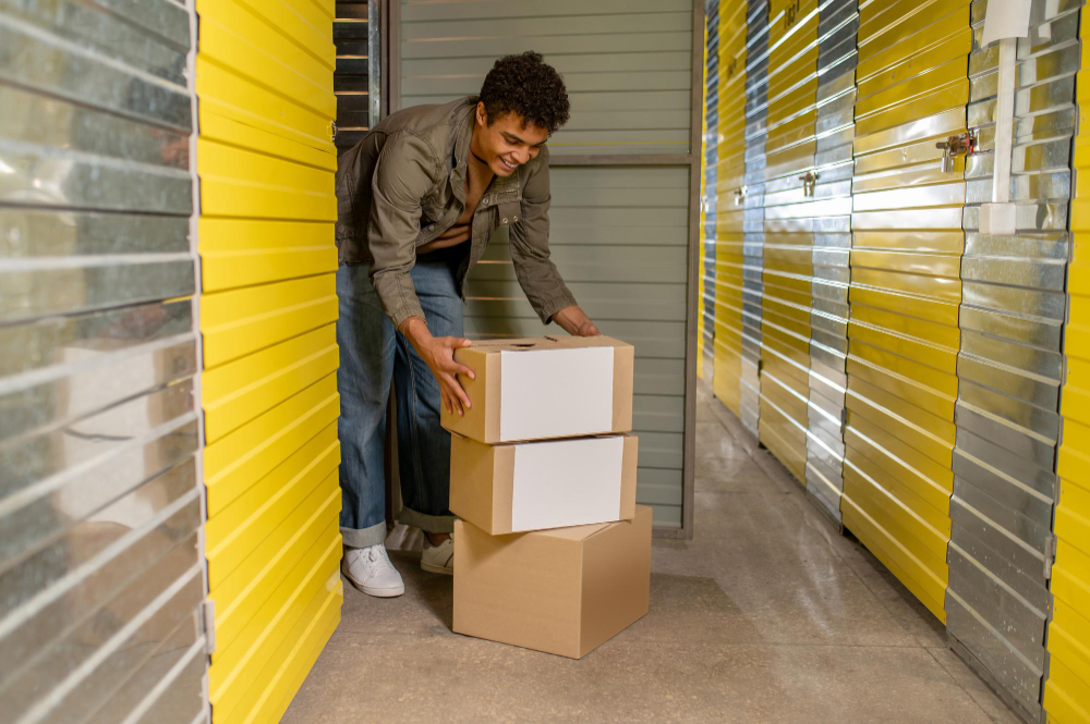 Climate-controlled storage facility with professional movers loading items for temporary storage during a Northglenn relocation