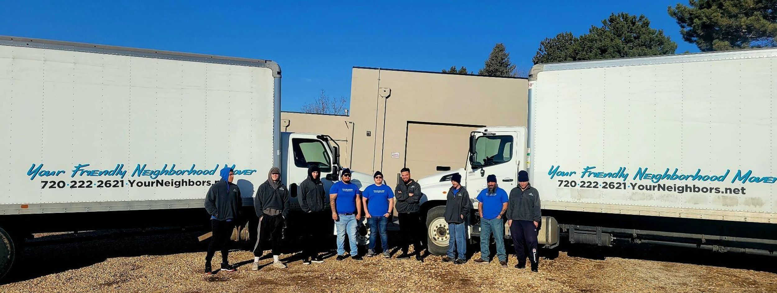 crew in front of a Your Neighbors moving truck