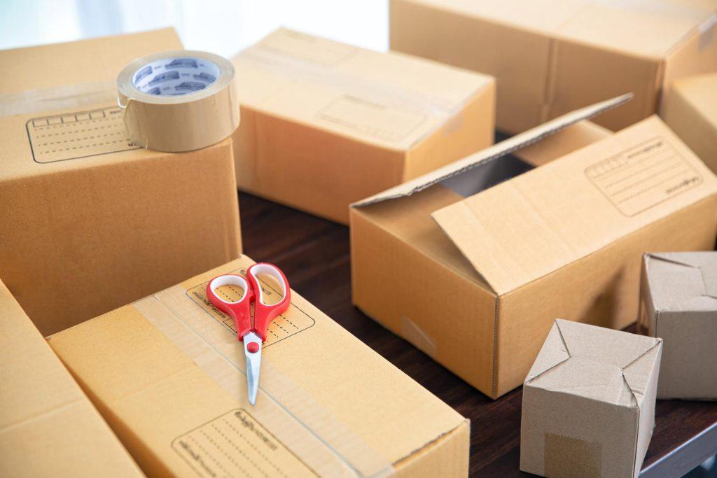Cardboard parcel boxes on wooden table